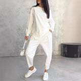 Ensemble femme sweat asymétrique avec pantalon assorti