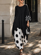 Angeline | Ensemble Deux Pièces Tunique Oversize Noire à Ourlet Asymétrique et Pantalon Sarouel à Pois