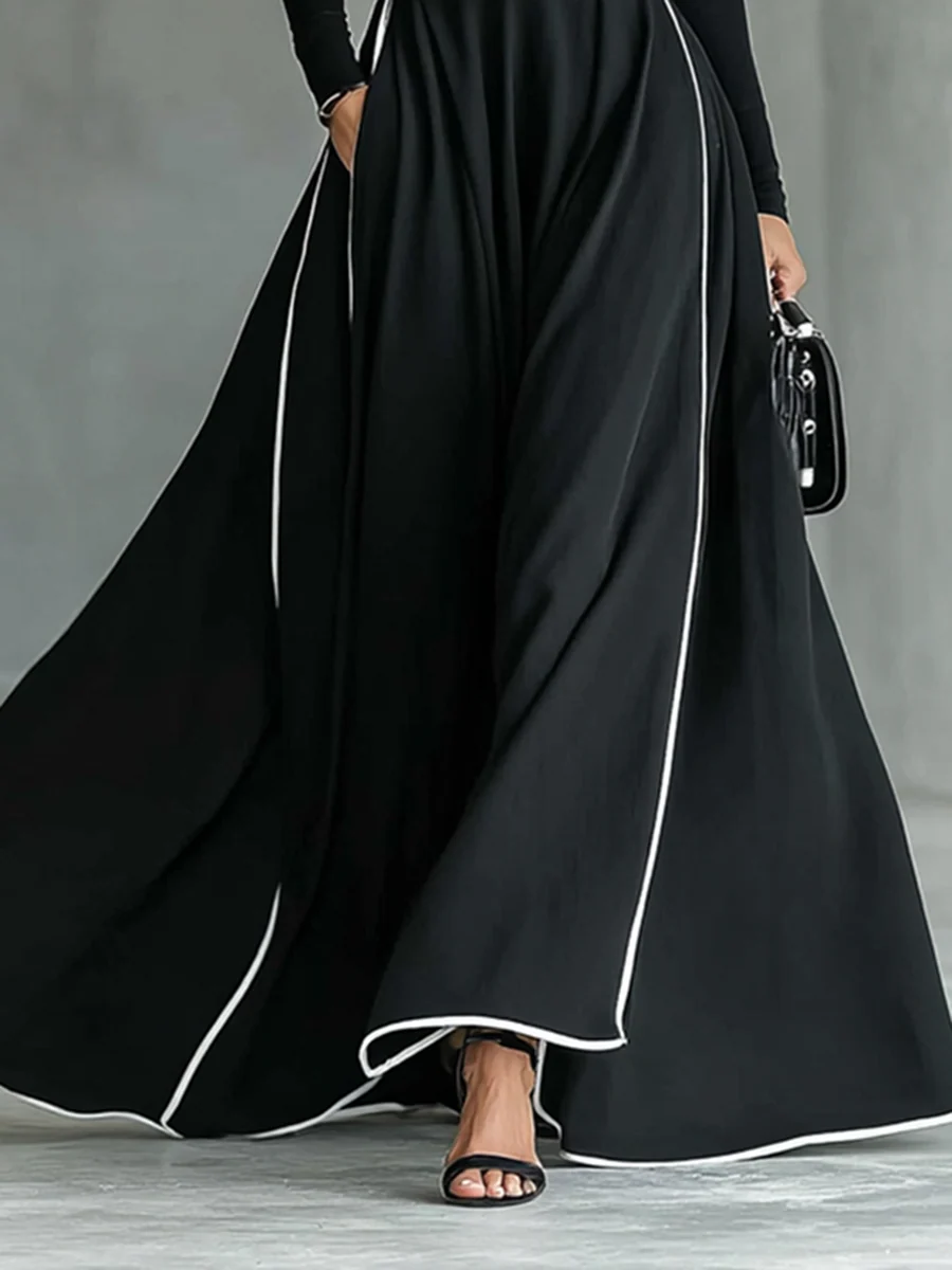 LEANDRA | Robe longue à col montant, bordures contrastées et ceinture