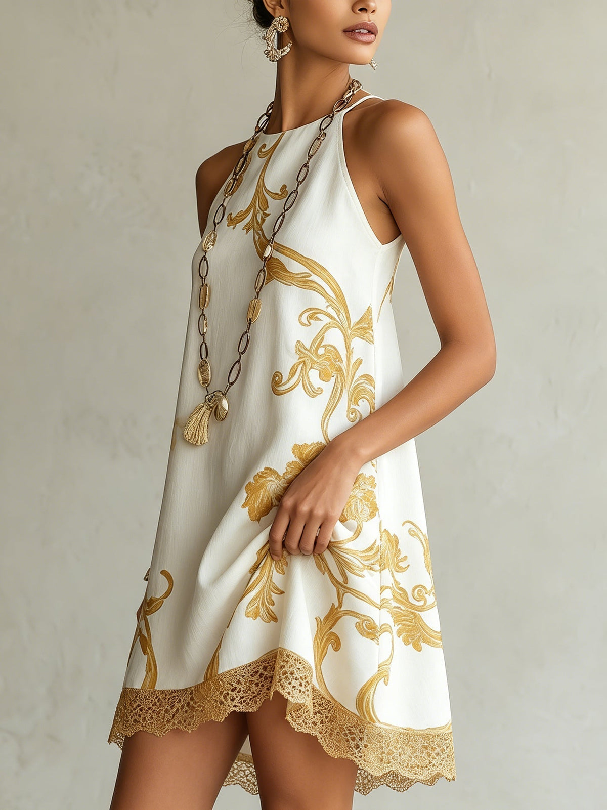 Héloïse | Robe mini blanche en dentelle à motifs dorés