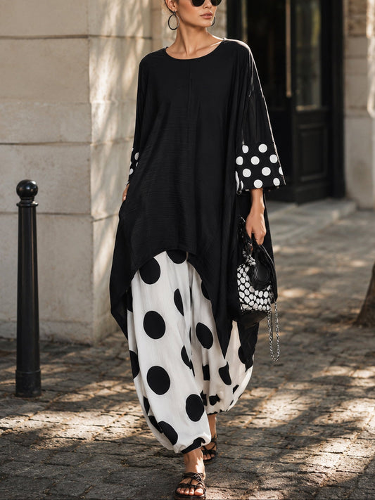 Angeline | Ensemble Deux Pièces Tunique Oversize Noire à Ourlet Asymétrique et Pantalon Sarouel à Pois