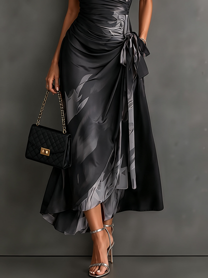 Albane | Robe Midi Portefeuille Imprimé Abstrait Gris et Noir, Col Chemise et Ourlet Asymétrique à Volants