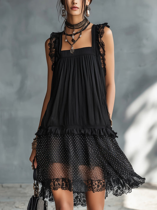 Pauline | Robe mini transparente noire à pois, volants et bordure en dentelle