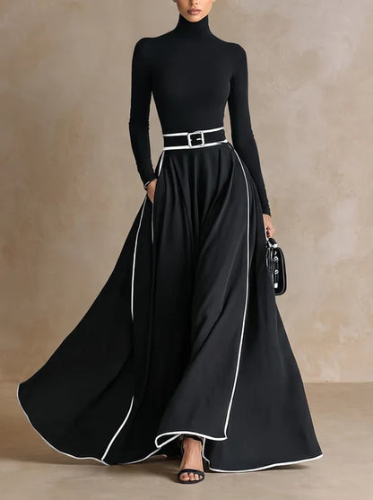 LEANDRA | Robe longue à col montant, bordures contrastées et ceinture
