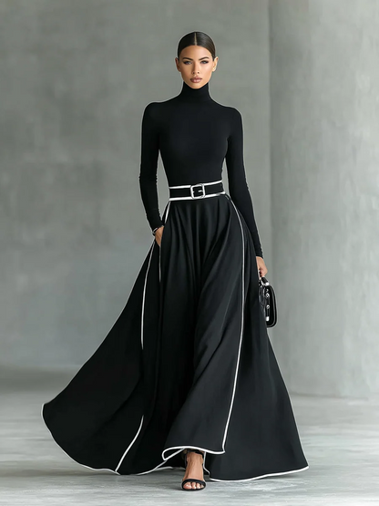 LEANDRA | Robe longue à col montant, bordures contrastées et ceinture